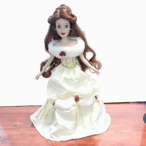 Elegant Porcelain Princess Doll with Cream Gown
